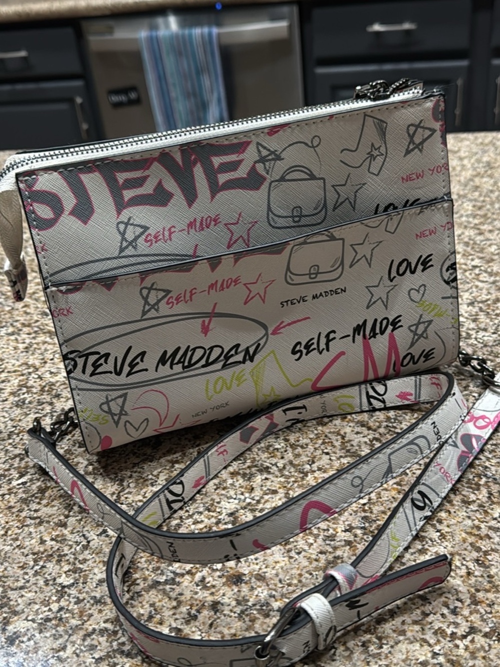 Steve Madden Cream Graffiti Print Crossbody Bag with Pink & Black Accents